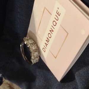 QVC "Diamonique" 5-stone halo ring in Sterling silver. Box and receipt included.